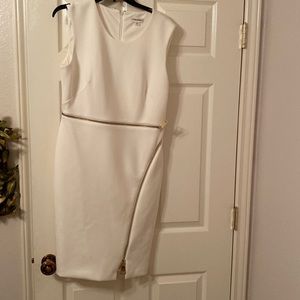 Gorgeous sleeveless off white bodycon dress.